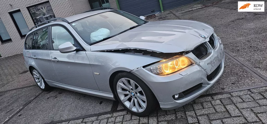 BMW 3-serie Touring 320d High Executive aut rijdbare schade