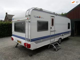 Hobby 24 560 lang breed 250 airco mover voortent tv compleet